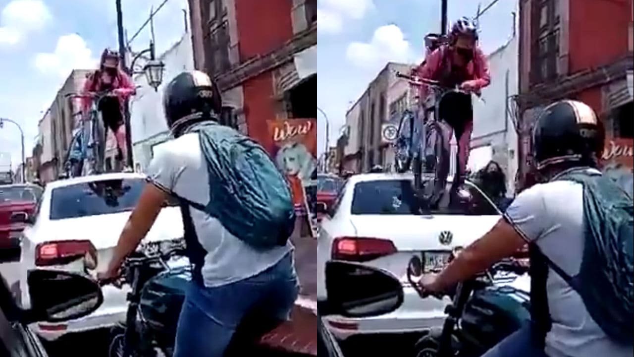 Ciclista pasa encima de carro con todo y bici por estacionarse en ciclovía: VIDEO 11ciclista-pasa-encima-de-carro-con-todo-y-bici-por-estacionarse-en-ciclovia